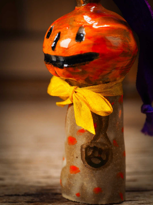 Original handmade ceramic jack-o-lantern pumpkin ornament by Idania Salcido Danita Art is a perfect Halloween decoration! Stands on its own or hangs from window