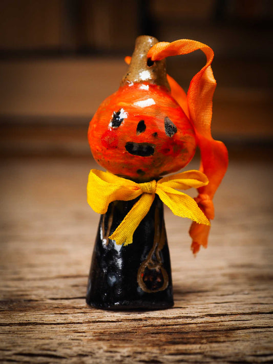 Original handmade ceramic jack-o-lantern pumpkin ornament by Idania Salcido Danita Art is a perfect Halloween decoration! Stands on its own or hangs from window