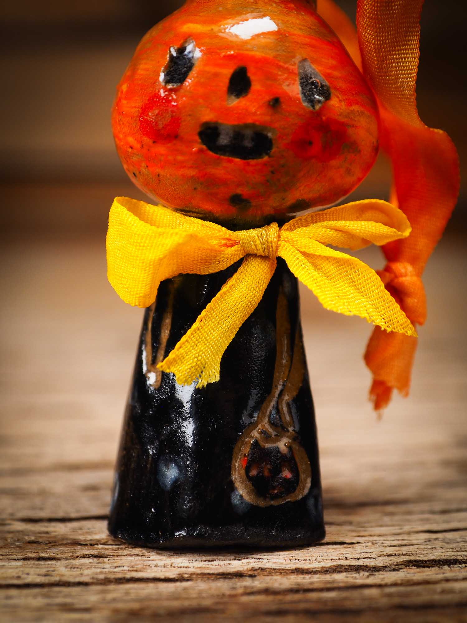 Original handmade ceramic jack-o-lantern pumpkin ornament by Idania Salcido Danita Art is a perfect Halloween decoration! Stands on its own or hangs from window