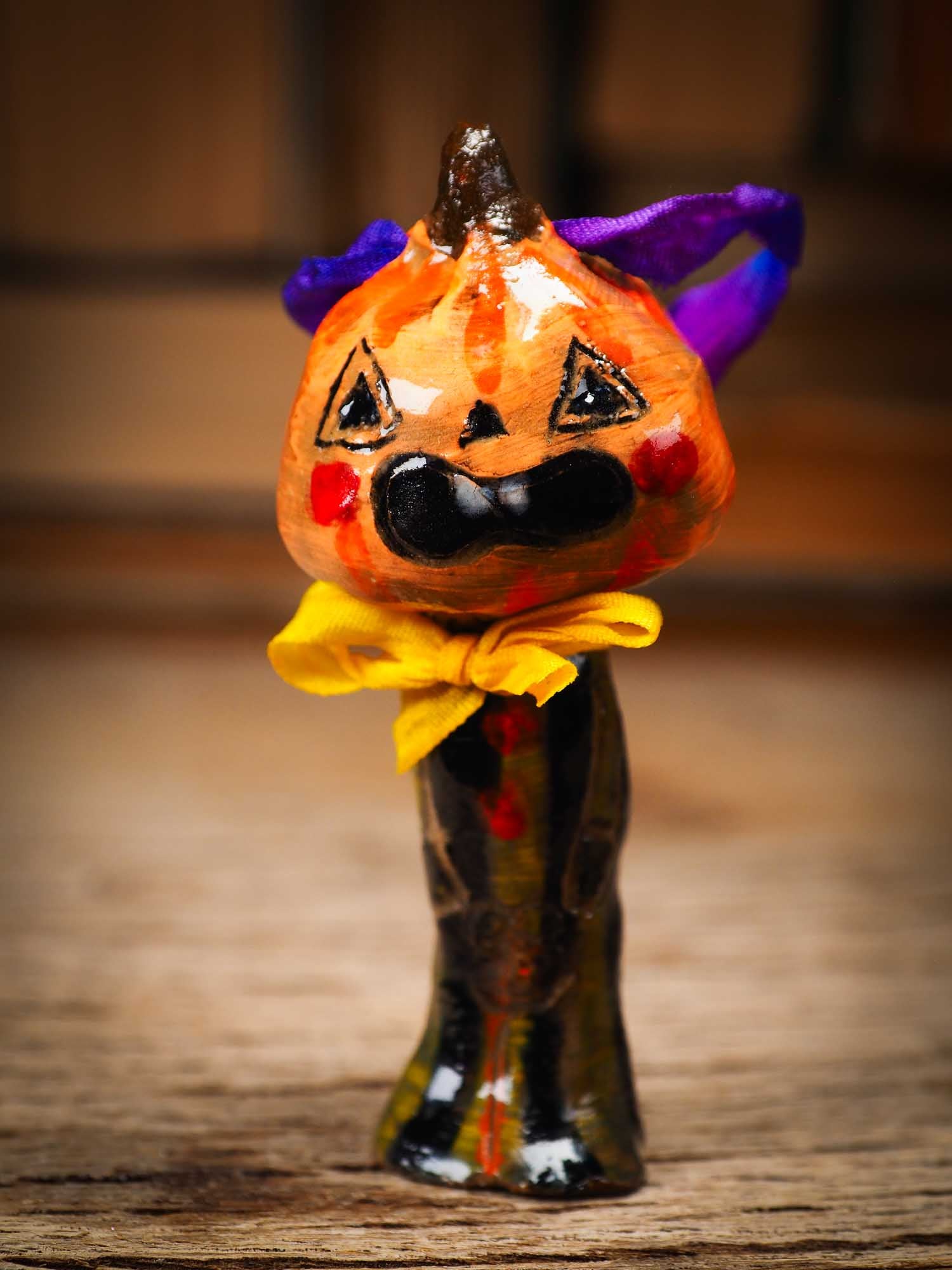 Original handmade ceramic jack-o-lantern pumpkin ornament by Idania Salcido Danita Art is a perfect Halloween decoration! Stands on its own or hangs from window