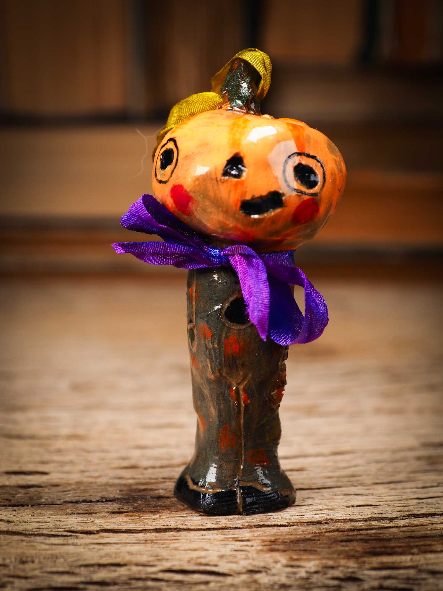 Original handmade ceramic jack-o-lantern pumpkin ornament by Idania Salcido Danita Art is a perfect Halloween decoration! Stands on its own or hangs from window