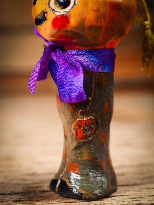 Original handmade ceramic jack-o-lantern pumpkin ornament by Idania Salcido Danita Art is a perfect Halloween decoration! Stands on its own or hangs from window