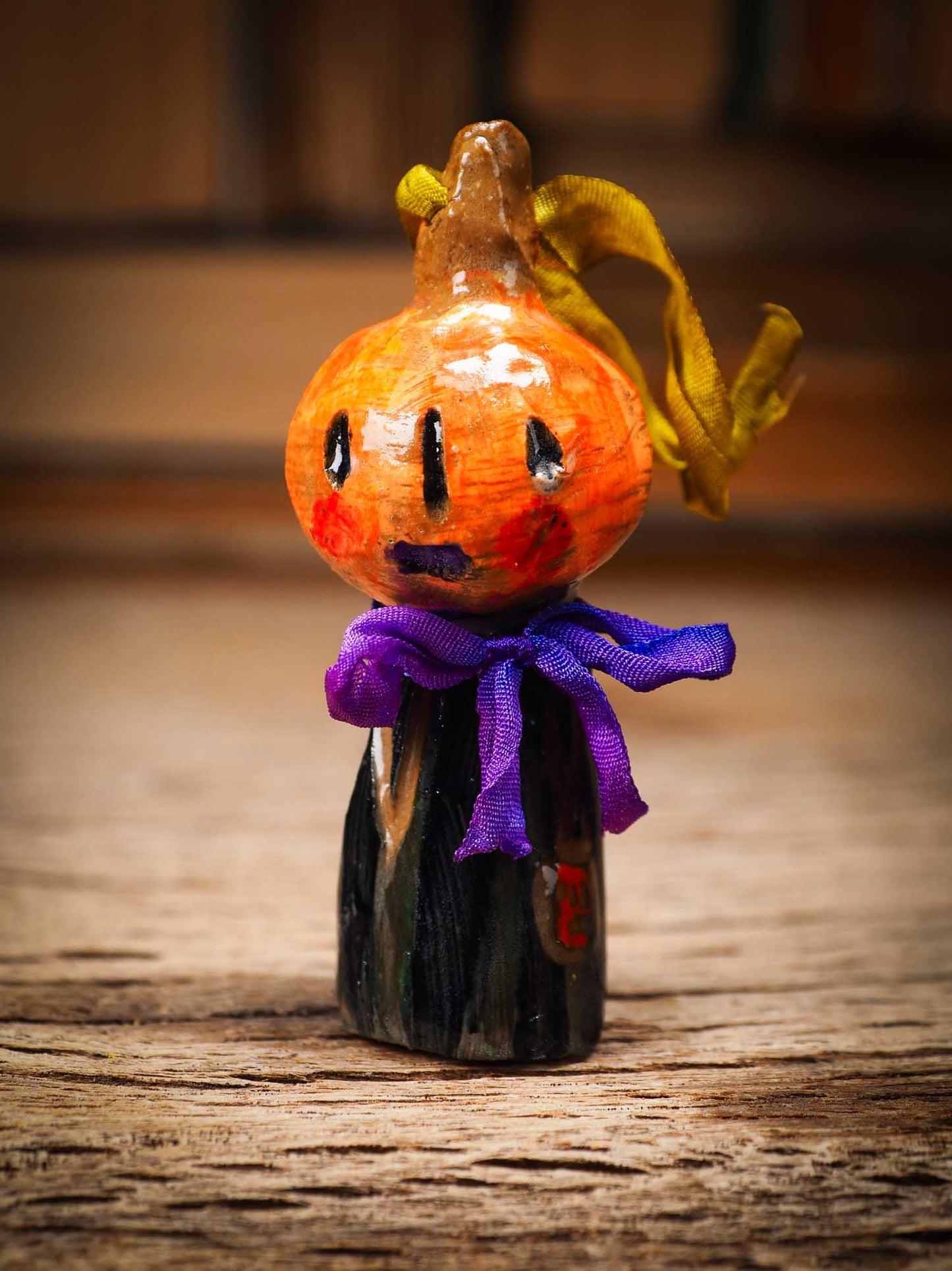 Original handmade ceramic jack-o-lantern pumpkin ornament by Idania Salcido Danita Art is a perfect Halloween decoration! Stands on its own or hangs from window
