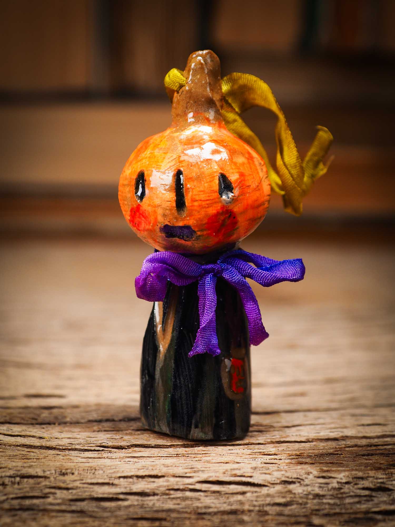 Original handmade ceramic jack-o-lantern pumpkin ornament by Idania Salcido Danita Art is a perfect Halloween decoration! Stands on its own or hangs from window