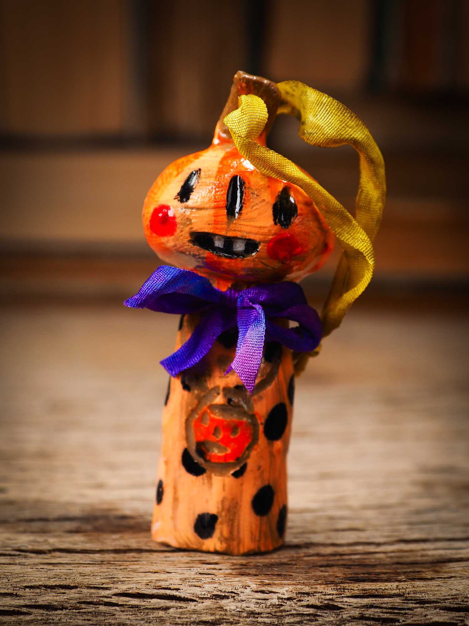 Original handmade ceramic jack-o-lantern pumpkin ornament by Idania Salcido Danita Art is a perfect Halloween decoration! Stands on its own or hangs from window