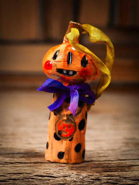 Original handmade ceramic jack-o-lantern pumpkin ornament by Idania Salcido Danita Art is a perfect Halloween decoration! Stands on its own or hangs from window