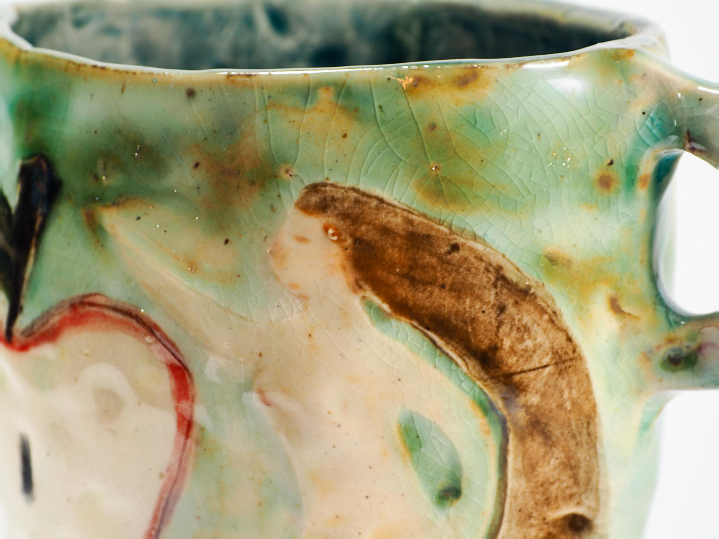 We Could Say No feminist ceramic art vase by Idania Salcido Danita Art featuring carved relief Adam & Eve reaching toward a sliced apple while the serpents lurks nearby.