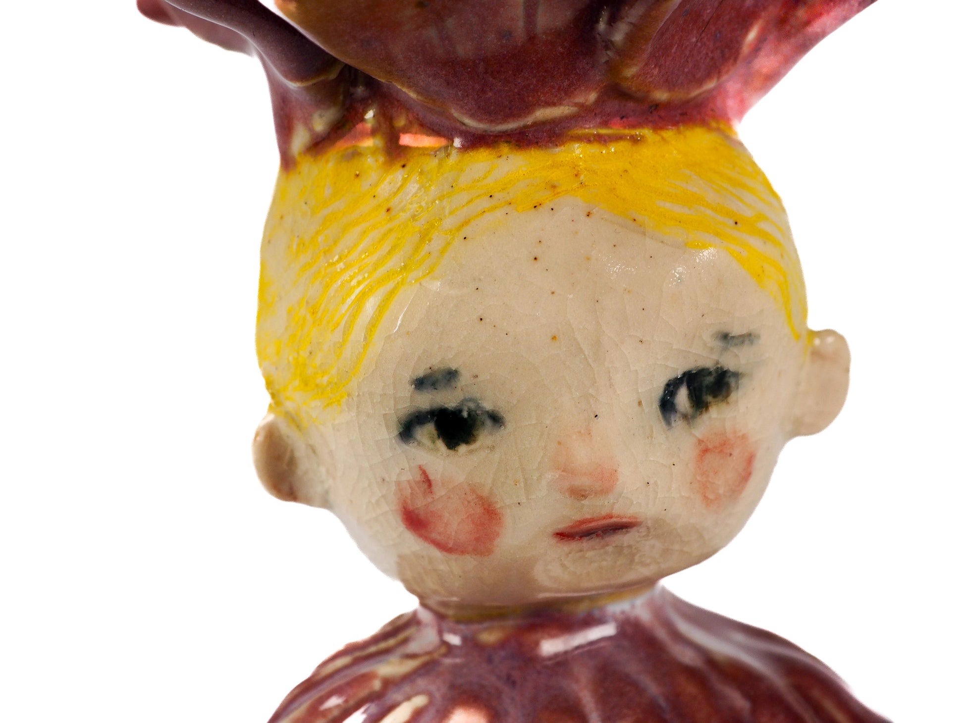 Original hand sculpted ceramic art vessel by Idania Salcido (Danita Art). With warm honey golden glazes. A gentle flower crowned girl seated in quiet reflection.