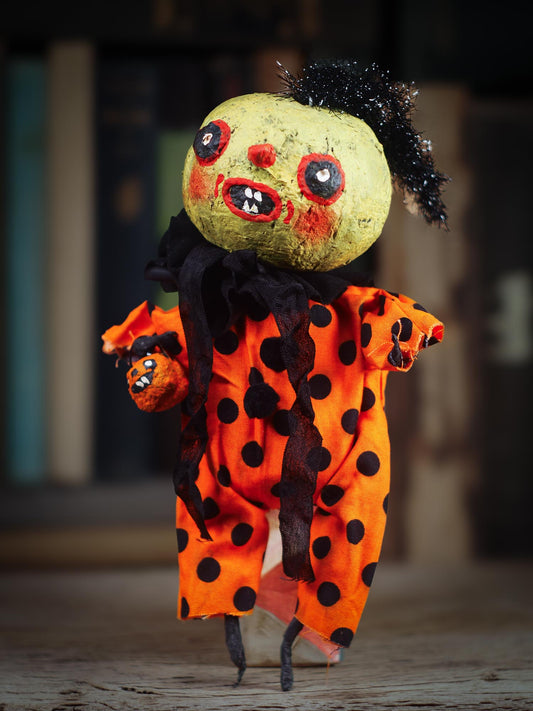 An original spooky cute outsider folk art Halloween Doll. Hand made using spun cotton, paper and fabric to create the perfect Halloween ornament for your tree. Specially made for someone who appreciates fine and unique art gifts, It is a one of a kind creation with an original design by Idania Salcido (Danita Art).