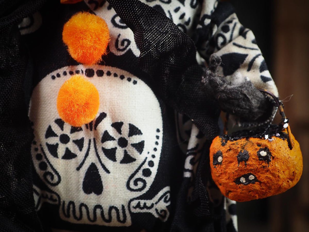 An original spooky cute outsider folk art Halloween Doll. Hand made using spun cotton, paper and fabric to create the perfect Halloween ornament for your tree. Specially made for someone who appreciates fine and unique art gifts, It is a one of a kind creation with an original design by Idania Salcido (Danita Art).