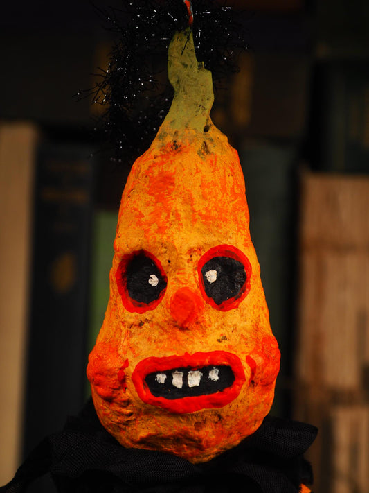 An original spooky cute outsider folk art Halloween Doll. Hand made using spun cotton, paper and fabric to create the perfect Halloween ornament for your tree. Specially created for someone who appreciates fine and unique art gifts, It is a one of a kind original design by Idania Salcido (Danita Art).