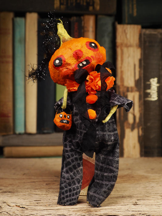 An original spooky cute folk outsider art Halloween Doll. Hand made using spun cotton, paper and fabric to create the perfect Halloween ornament for your tree. Specially created for someone who appreciates fine and unique art gifts, It is a one of a kind original design by Idania Salcido (Danita Art).