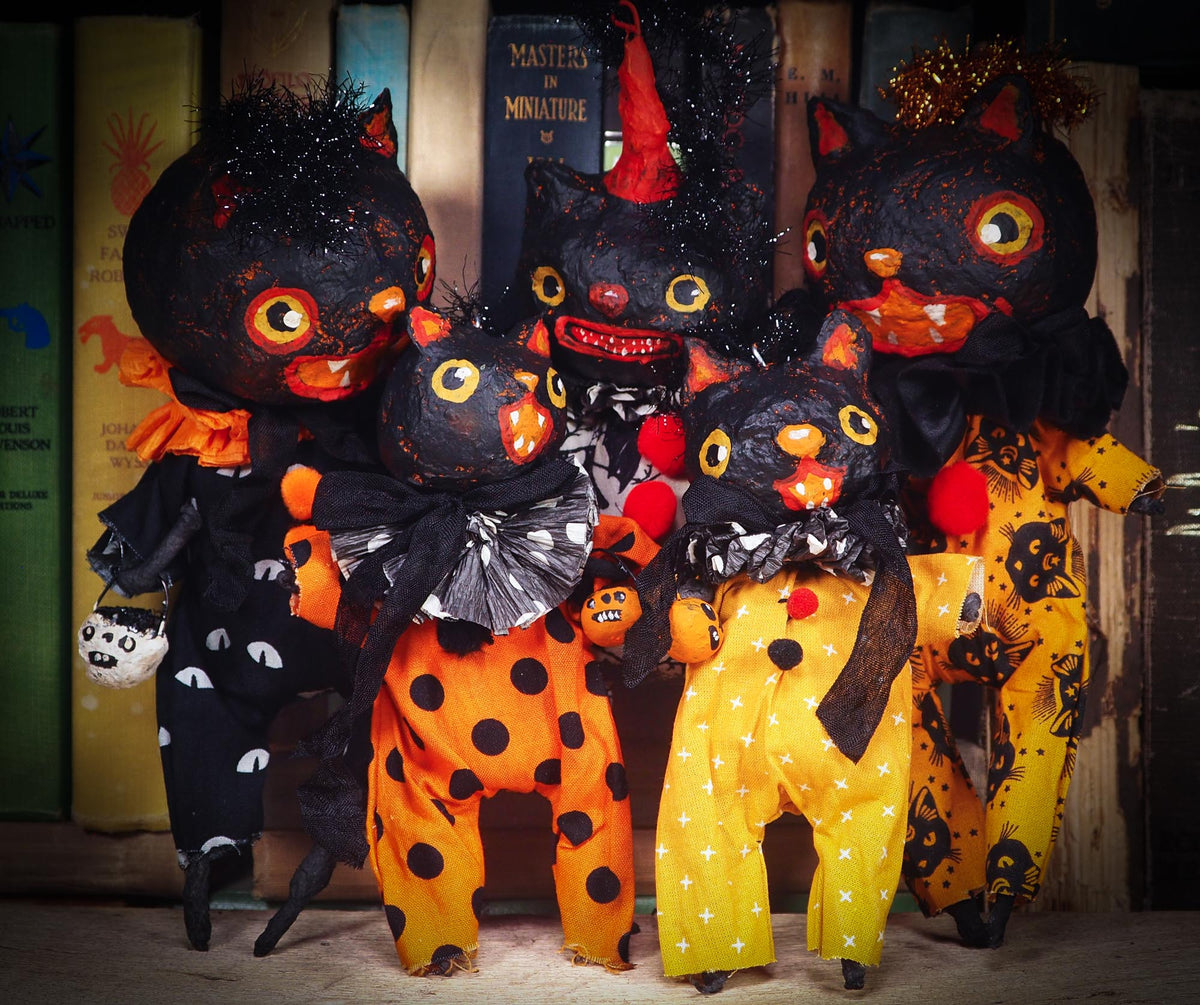 A collection of original spooky cute outsider folk art Halloween Black Cat Dolls. Hand made using spun cotton, paper and fabric to create the perfect Halloween ornaments for your tree. Specially made for someone who appreciates fine and unique art gifts, each one is a one of a kind creation with an original design by Idania Salcido (Danita Art).