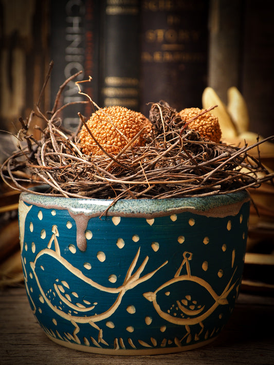 You are looking at original handmade fire glazed stoneware ceramic piece with sgraffito bird and peasant girl motifs in a deep aquamarine color by Idania Salcido, the artist behind Danita Art.  Each original Danita Art ceramics piece is unique and special and cannot be repeated. You are getting a one of a kind work of art to display, or use it as one of your favorite home decorations.