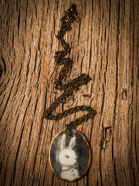 Unique fired ceramic porcelain necklace oval pendant by Idania Salcido, the artist behind Danita Art. Each jewelry setting is hand drawn and illustrated by the artist in her art studio, perfect for any dressing style. A casual gathering with friends or a fancy formal dinner, this necklace is a perfect fashion accessory.