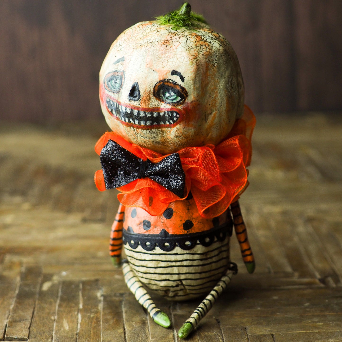 Original Halloween art doll original creation by Danita Art. Paper Clay, sculpted and painted in a spooky whimsical unique work of art. Pumpkin.