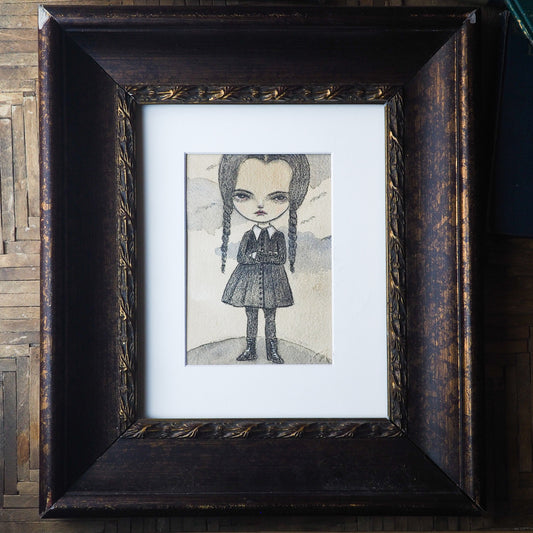 Wednesday Addams in watercolor and pencil by Danita. Creamy paper stands out this illustration on creamy paper. Great for Halloween decoration and any home decor.