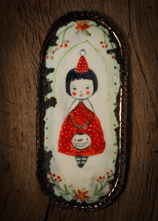 An original Christmas Holiday cake dinner dessert plate round glazed ceramic dinnerware handmade by Idania Salcido, the artist behind Danita Art. Glazed carved sgraffito stoneware, hand painted and decorated, it is illustrated by hand with snowmen, Christmas trees, Santa Claus, angels and snowballs and winter themes.