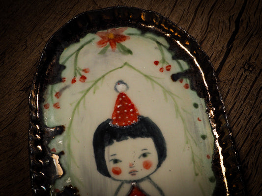 An original Christmas Holiday cake dinner dessert plate round glazed ceramic dinnerware handmade by Idania Salcido, the artist behind Danita Art. Glazed carved sgraffito stoneware, hand painted and decorated, it is illustrated by hand with snowmen, Christmas trees, Santa Claus, angels and snowballs and winter themes.