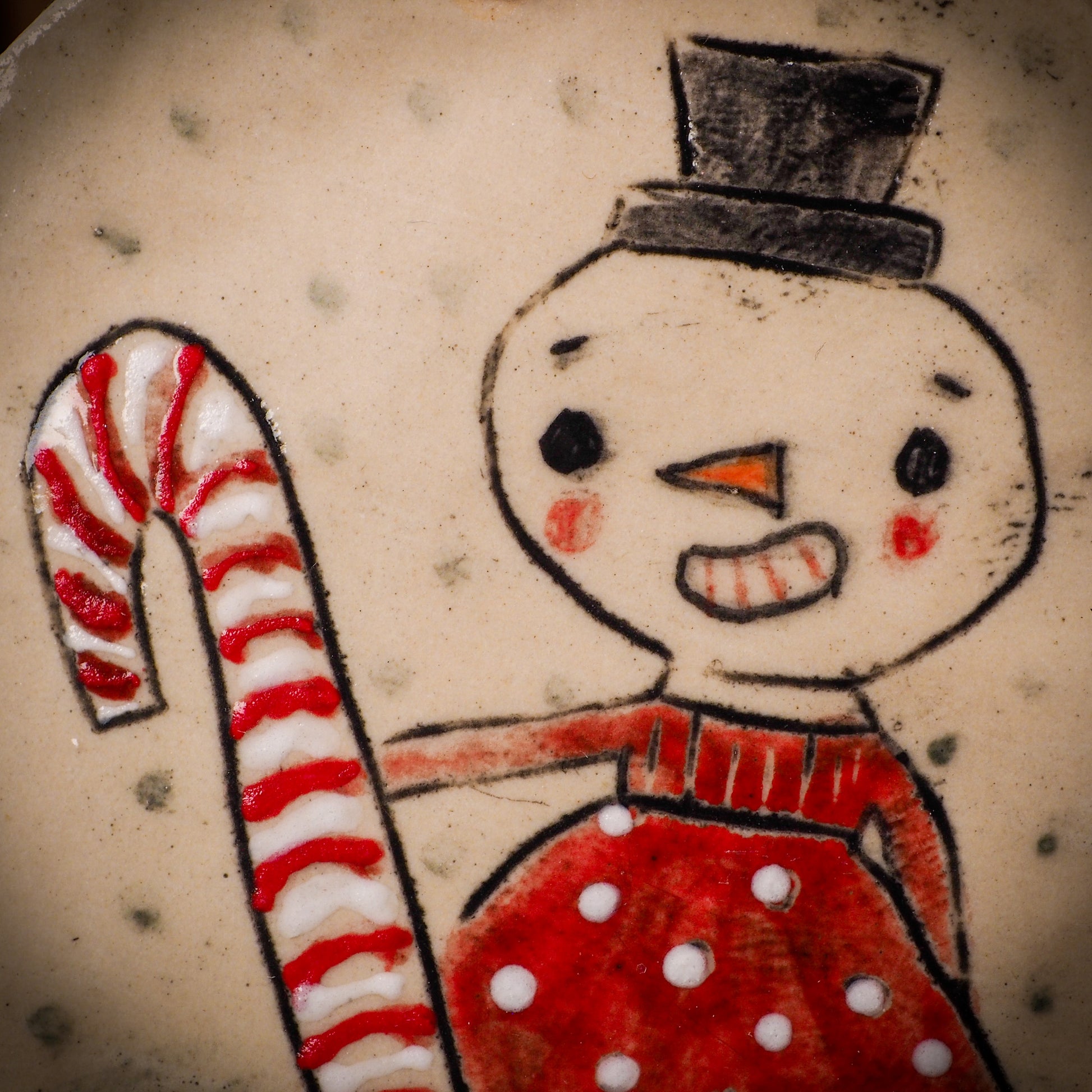 An original Christmas Holiday tree round glazed ceramic ornament handmade by Idania Salcido, the artist behind Danita Art. Glazed carved sgraffito stoneware, hand painted and decorated, it is illustrated by hand with winter scenes with snowmen, Christmas trees, Santa Claus, snow balls and winter themes.