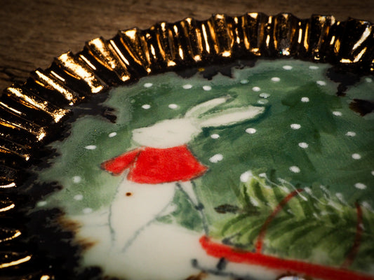 An original Christmas Holiday cake dinner dessert plate round glazed ceramic dinnerware handmade by Idania Salcido, the artist behind Danita Art. Glazed carved sgraffito stoneware, hand painted and decorated, it is illustrated by hand with snowmen, Christmas trees, Santa Claus, angels and snowballs and winter themes.