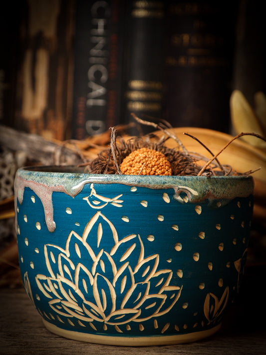 You are looking at original handmade fire glazed stoneware ceramic piece with sgraffito bird and peasant girl motifs in a deep aquamarine color by Idania Salcido, the artist behind Danita Art.  Each original Danita Art ceramics piece is unique and special and cannot be repeated. You are getting a one of a kind work of art to display, or use it as one of your favorite home decorations.