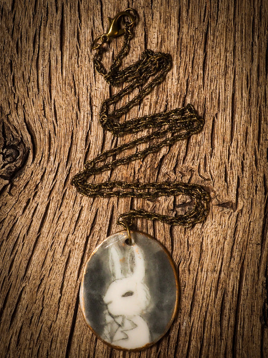 Unique fired ceramic porcelain necklace oval pendant by Idania Salcido, the artist behind Danita Art. Each jewelry setting is hand drawn and illustrated by the artist in her art studio, perfect for any dressing style. A casual gathering with friends or a fancy formal dinner, this necklace is a perfect fashion accessory.
