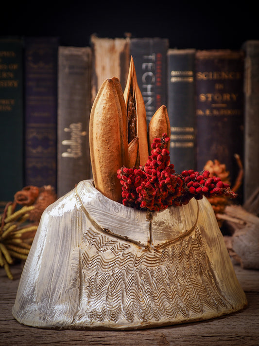 Using hand pinching techniques in of a kind fire glazed ceramics, Idania Salcido, the artist behind Danita Art, sculpted glazed ceramic clay vase containers and flower pots in the shape of vintage blouses. Beautiful accents for your dinner table, showcase or anywhere you want to remind you of family and love.