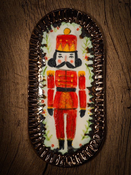 An original Christmas Holiday cake dinner dessert plate round glazed ceramic dinnerware handmade by Idania Salcido, the artist behind Danita Art. Glazed carved sgraffito stoneware, hand painted and decorated, it is illustrated by hand with snowmen, Christmas trees, Santa Claus, angels and snowballs and winter themes.