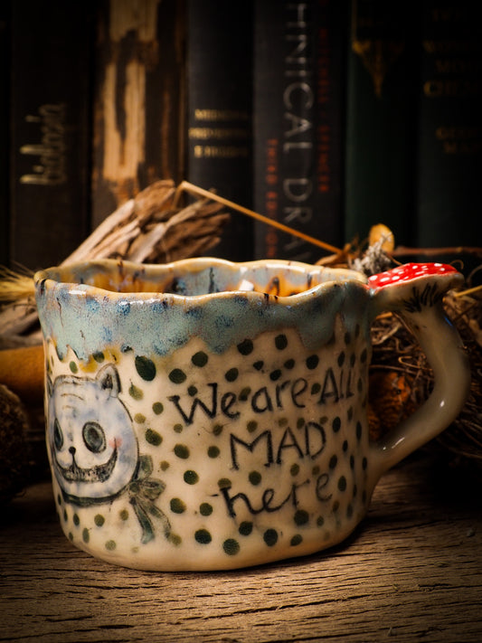 WE’RE ALL MAD HERE - CERAMIC MUG