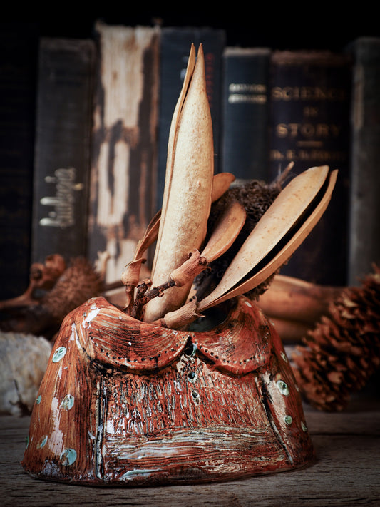 Using hand pinching techniques in of a kind fire glazed ceramics, Idania Salcido, the artist behind Danita Art, sculpted glazed ceramic clay vase containers and flower pots in the shape of vintage blouses. Beautiful accents for your dinner table, showcase or anywhere you want to remind you of family and love.