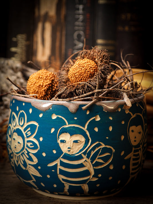 You are looking at original handmade fire glazed stoneware ceramic piece with sgraffito bird and peasant girl motifs in a deep aquamarine color by Idania Salcido, the artist behind Danita Art.  Each original Danita Art ceramics piece is unique and special and cannot be repeated. You are getting a one of a kind work of art to display, or use it as one of your favorite home decorations.