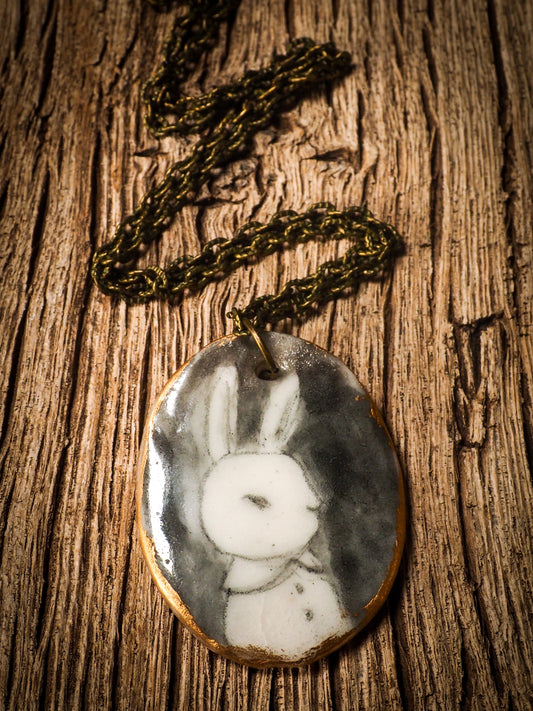 Unique fired ceramic porcelain necklace oval pendant by Idania Salcido, the artist behind Danita Art. Each jewelry setting is hand drawn and illustrated by the artist in her art studio, perfect for any dressing style. A casual gathering with friends or a fancy formal dinner, this necklace is a perfect fashion accessory.