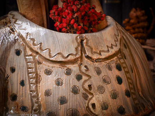 Using hand pinching techniques in of a kind fire glazed ceramics, Idania Salcido, the artist behind Danita Art, sculpted glazed ceramic clay vase containers and flower pots in the shape of vintage blouses. Beautiful accents for your dinner table, showcase or anywhere you want to remind you of family and love.