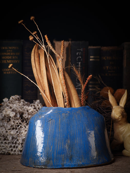 Using hand pinching techniques in of a kind fire glazed ceramics, Idania Salcido, the artist behind Danita Art, sculpted glazed ceramic clay vase containers and flower pots in the shape of vintage blouses. Beautiful accents for your dinner table, showcase or anywhere you want to remind you of family and love.