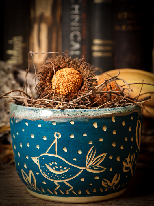 You are looking at original handmade fire glazed stoneware ceramic piece with sgraffito bird and peasant girl motifs in a deep aquamarine color by Idania Salcido, the artist behind Danita Art.  Each original Danita Art ceramics piece is unique and special and cannot be repeated. You are getting a one of a kind work of art to display, or use it as one of your favorite home decorations.