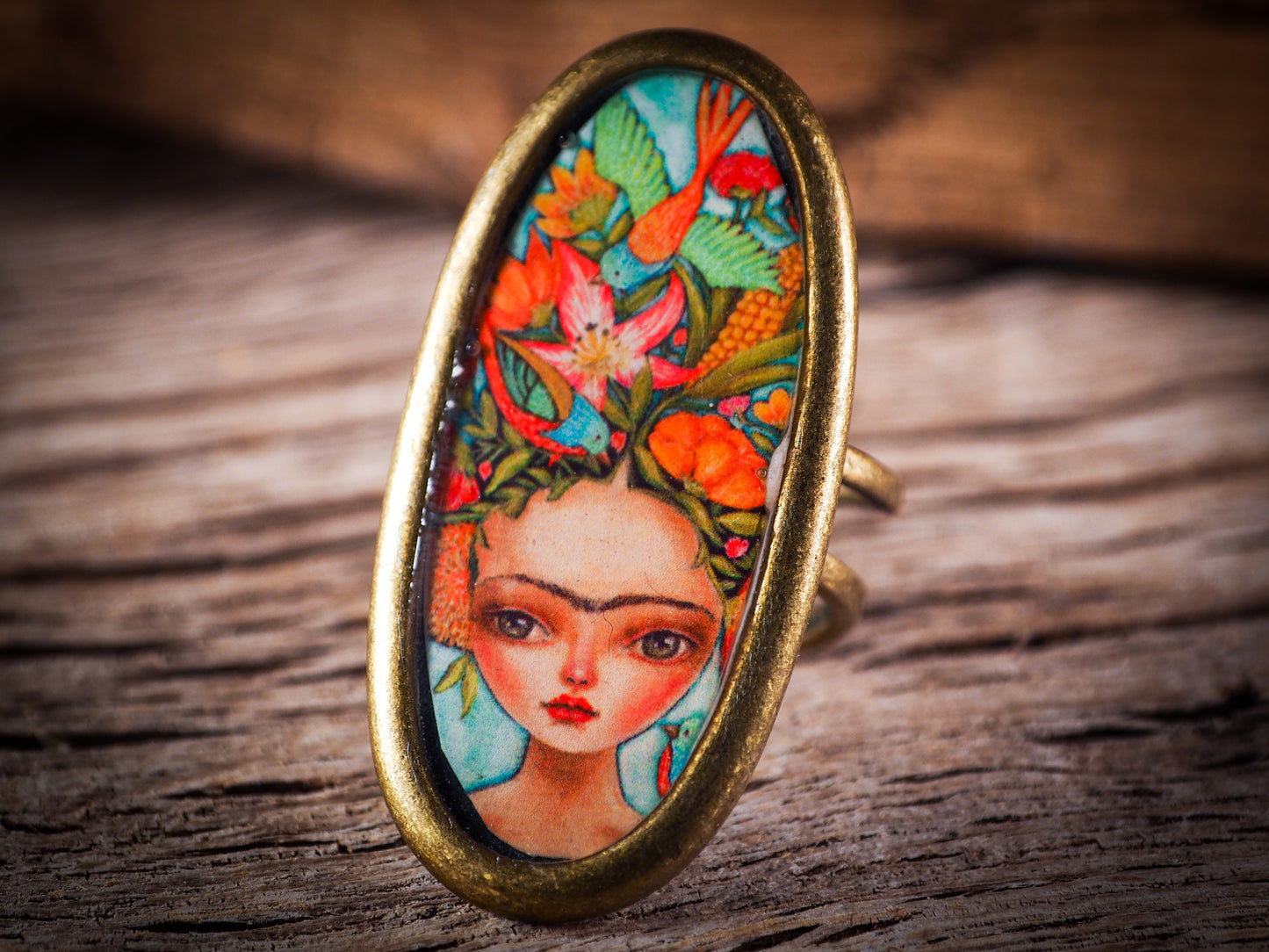An original, one of a kind handmade jewelry by Idania Salcido, the artist behind Danita Art. Adjustable ring to different finger sizes, the oval image will create a statement of boldness and confidence that will draw looks and attention to your hands when you wear this powerful little piece with one of my favorite image.