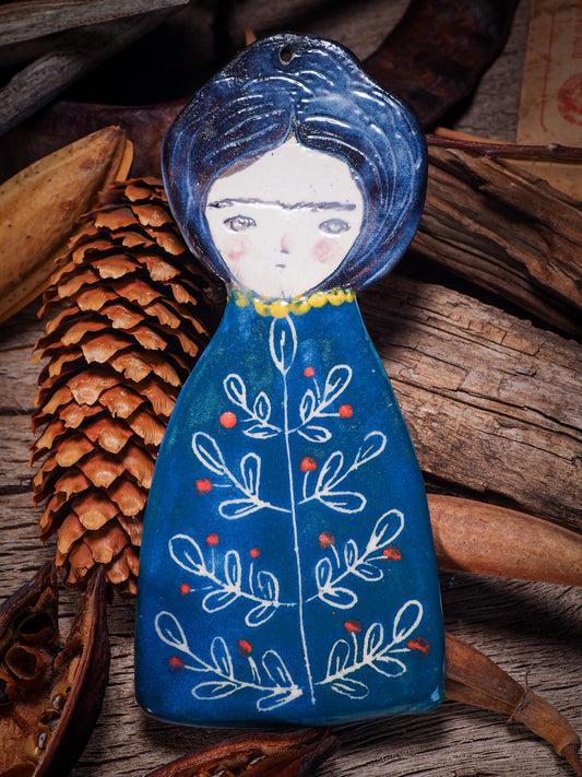 An original Christmas Holiday tree glazed ceramic ornament handmade by Idania Salcido, the artist behind Danita Art. Glazed carved sgraffito stoneware, hand painted and decorated, it is illustrated by hand with Frida Kahlo, Mexican motifs and bold, bright and colorful ceramic glazes.