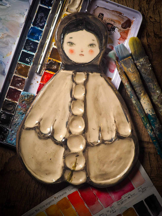 Each artist paint palette by Idania Salcido, the artist behind Danita Art, is hand sculpted and fired with paint and scratch resistant glazes and with enough paint wells to keep and mix colors at ease. Acrylics, Oils and watercolors can be used, it is perfect for any medium! Clean with water or mineral spirits.