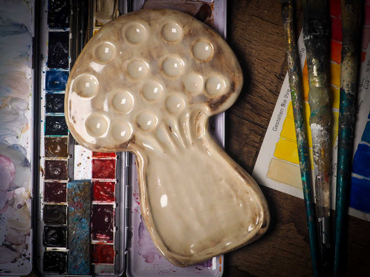 Each artist paint palette by Idania Salcido, the artist behind Danita Art, is hand sculpted and fired with paint and scratch resistant glazes and with enough paint wells to keep and mix colors at ease. Acrylics, Oils and watercolors can be used, it is perfect for any medium! Clean with water or mineral spirits.