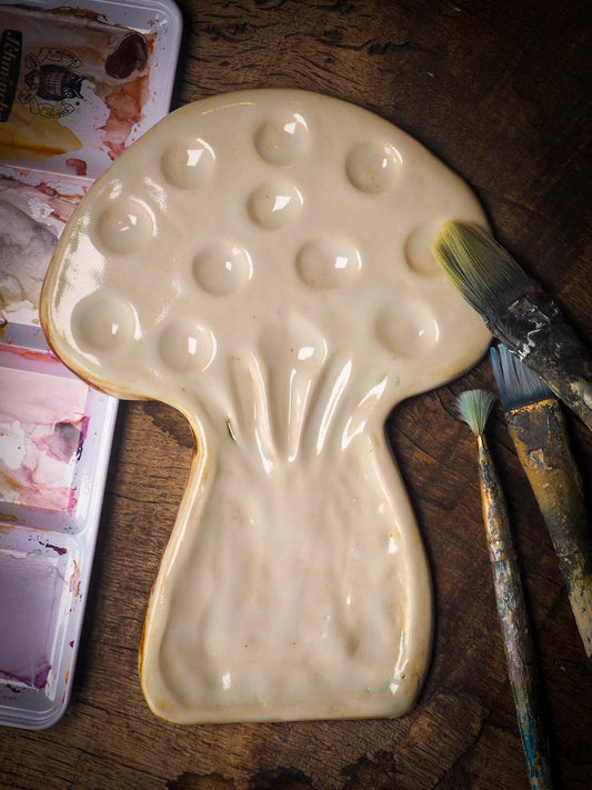 Each artist paint palette by Idania Salcido, the artist behind Danita Art, is hand sculpted and fired with paint and scratch resistant glazes and with enough paint wells to keep and mix colors at ease. Acrylics, Oils and watercolors can be used, it is perfect for any medium! Clean with water or mineral spirits.