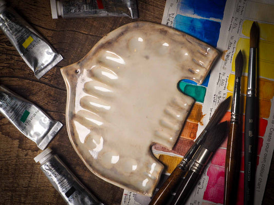 Each artist paint glazed ceramic palette by Idania Salcido, the artist behind Danita Art, is hand sculpted and fired with paint and scratch resistant glazes and with enough paint wells to keep and mix colors at ease. Acrylics, Oils and watercolors can be used, it is perfect for any medium! Clean with water or mineral spirits.