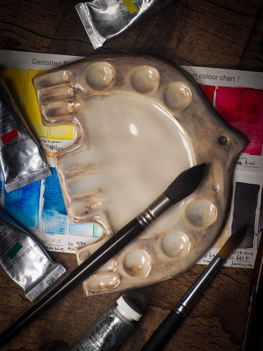 Each artist paint glazed ceramic palette by Idania Salcido, the artist behind Danita Art, is hand sculpted and fired with paint and scratch resistant glazes and with enough paint wells to keep and mix colors at ease. Acrylics, Oils and watercolors can be used, it is perfect for any medium! Clean with water or mineral spirits.