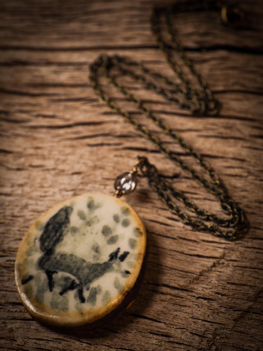 Unique fired ceramic porcelain necklace oval pendant by Idania Salcido, the artist behind Danita Art. Each jewelry setting is hand drawn and illustrated by the artist in her art studio, perfect for any dressing style. A casual gathering with friends or a fancy formal dinner, this necklace is a perfect fashion accessory.