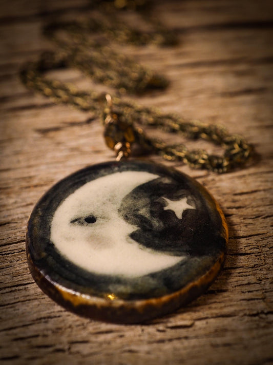 Unique fired ceramic porcelain necklace oval pendant by Idania Salcido, the artist behind Danita Art. Each jewelry setting is hand drawn and illustrated by the artist in her art studio, perfect for any dressing style. A casual gathering with friends or a fancy formal dinner, this necklace is a perfect fashion accessory.