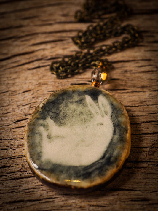 Unique fired ceramic porcelain necklace oval pendant by Idania Salcido, the artist behind Danita Art. Each jewelry setting is hand drawn and illustrated by the artist in her art studio, perfect for any dressing style. A casual gathering with friends or a fancy formal dinner, this necklace is a perfect fashion accessory.