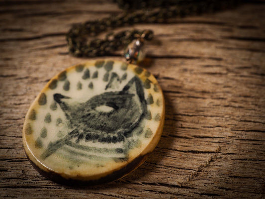 Unique fired ceramic porcelain necklace oval pendant by Idania Salcido, the artist behind Danita Art. Each jewelry setting is hand drawn and illustrated by the artist in her art studio, perfect for any dressing style. A casual gathering with friends or a fancy formal dinner, this necklace is a perfect fashion accessory.