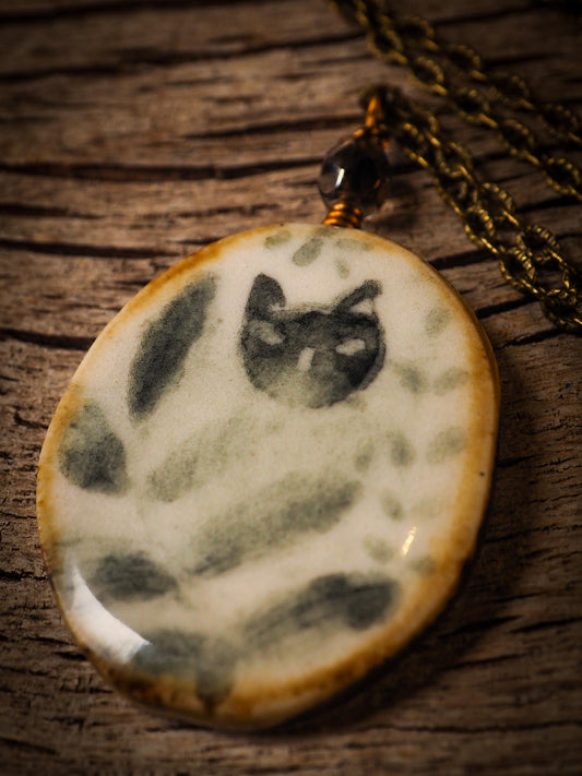 Unique fired ceramic porcelain necklace oval pendant by Idania Salcido, the artist behind Danita Art. Each jewelry setting is hand drawn and illustrated by the artist in her art studio, perfect for any dressing style. A casual gathering with friends or a fancy formal dinner, this necklace is a perfect fashion accessory.