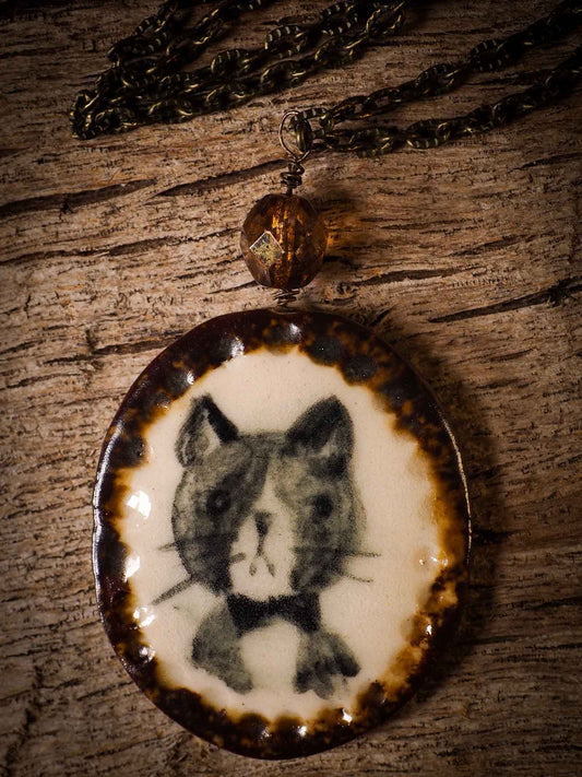 Unique fired ceramic porcelain necklace oval pendant by Idania Salcido, the artist behind Danita Art. Each jewelry setting is hand drawn and illustrated by the artist in her art studio, perfect for any dressing style. A casual gathering with friends or a fancy formal dinner, this necklace is a perfect fashion accessory.