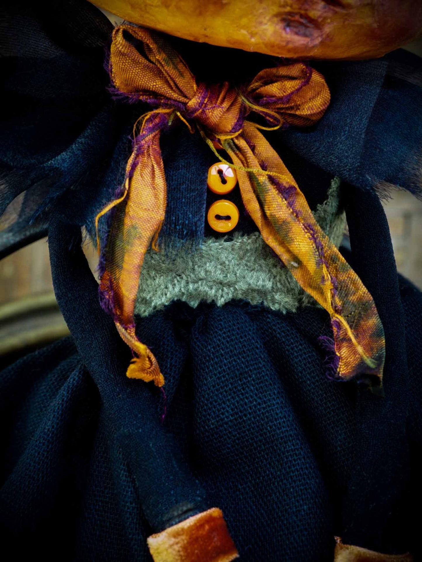 A witch transformed a girl into a Halloween pumpkin monster. This Danita original doll is a handmade jack-o-lantern soft sculpture as home decoration ornament. Carefully handmade with whimsical folk art roots, the spooky ghosts, witches, vampires, ghouls, and jack-o-lantern doll toys of Danita are full of mystery lore.